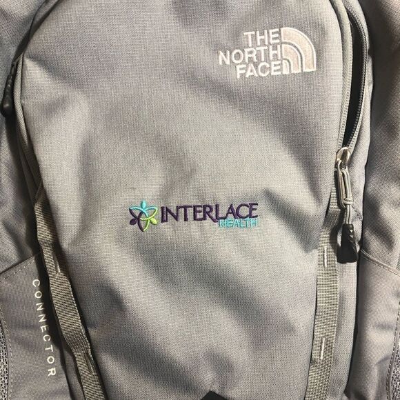 The North Face Connector Laptop Backpack With FlexVent And Adjustable Straps.